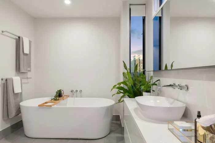 Reglazed freestanding bathtub and vessel sink in Northwood, Irvine